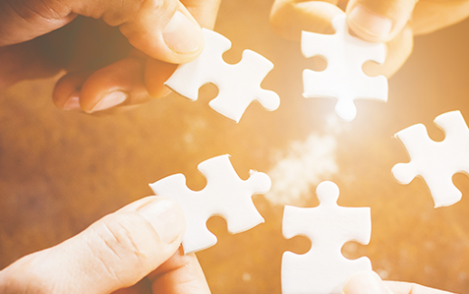 hand-of-diverse-people-connecting-jigsaw-puzzle-concept-of-partnership-and-teamwork-in-business